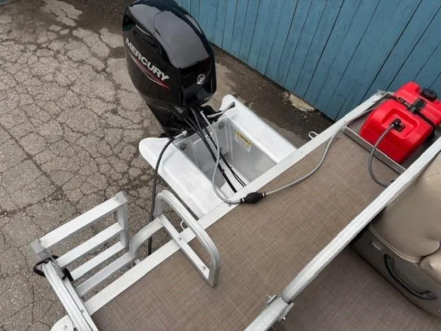 Slide: The Image of 2021 Sun Tracker Bass Buggy 16 XL with Mercury outboard motor and fuel tank. - 24