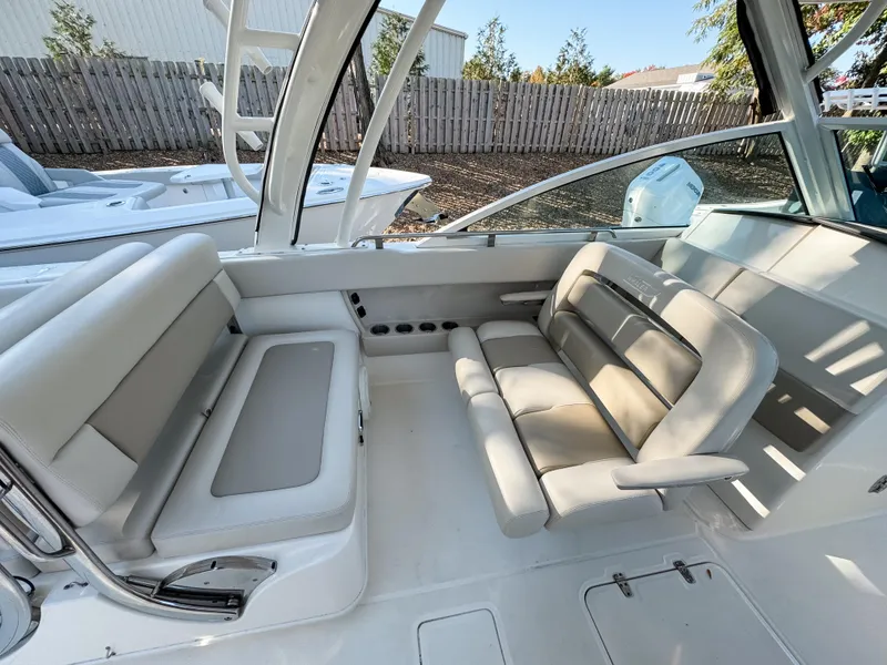 Slide: The Image of 2017 Boston Whaler 320 Vantage interior with comfortable seating and modern design. - 12
