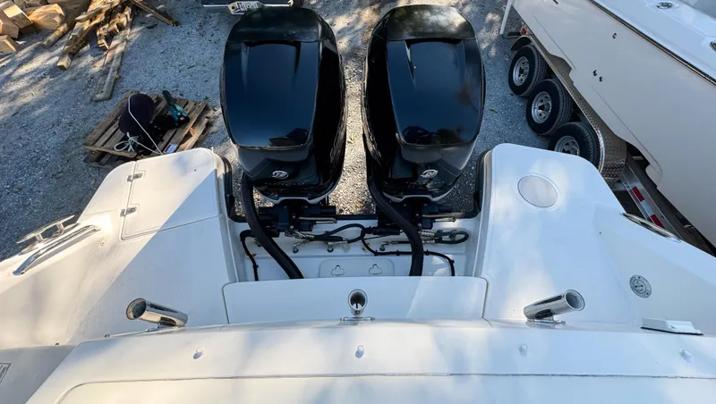 Slide: The Image of 2017 Boston Whaler 320 Vantage with dual outboard engines, viewed from above. - 4