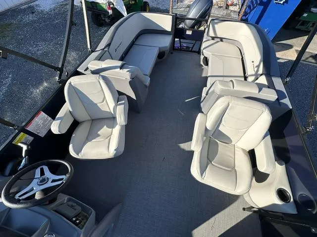 Slide: The Image of 2025 Starcraft GX 22 R DH boat interior with spacious seating and modern design. - 5