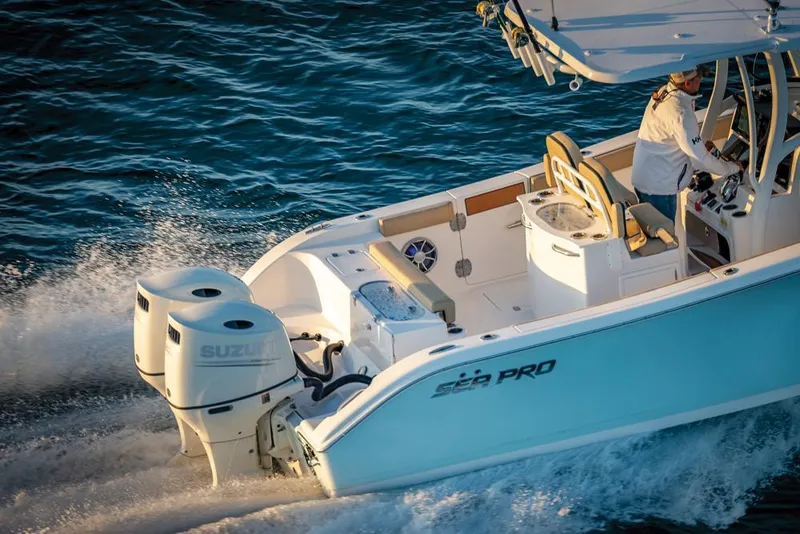 Slide: The Image of 2025 Sea Pro 262 Offshore boat interior with open storage compartment. - 17