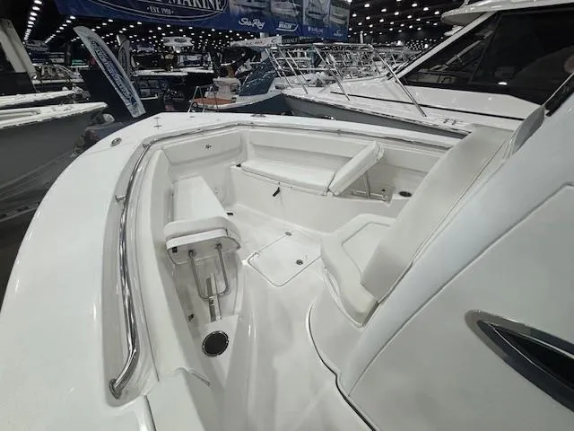 Slide: The Image of 2025 Sea Pro 262 Offshore boat interior with white seating and sleek design. - 20