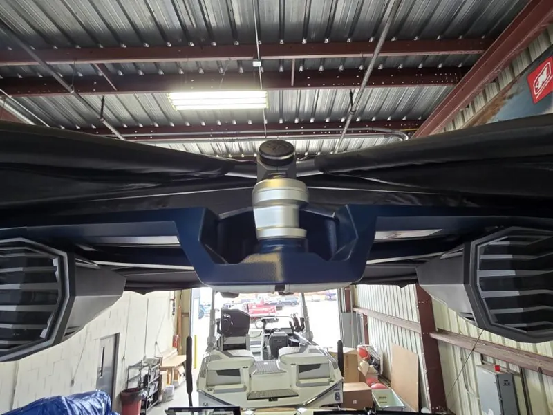 Slide: The Image of 2025 Nautique Super Air Nautique G23 boat detail in a warehouse setting. - 10