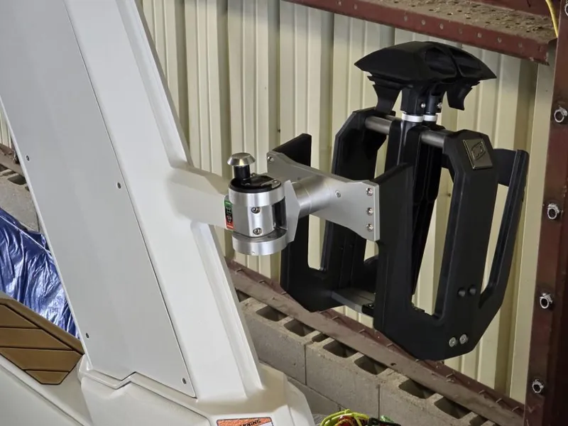 Slide: The Image of 2025 Nautique Super Air Nautique G23 wakeboard rack detail in a storage setting. - 30