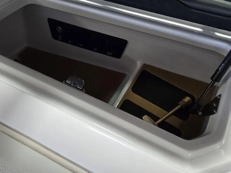 Slide: The Image of Storage compartment of 2025 Nautique Super Air Nautique G23 boat. - 4