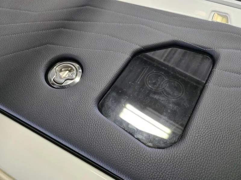 Slide: The Image of 2025 Nautique Super Air Nautique G23 interior detail with centennial edition emblem. - 5