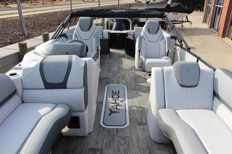 Slide: The Image of 2025 Tahoe Pontoon Cascade QLS interior with luxurious seating and modern design. - 12