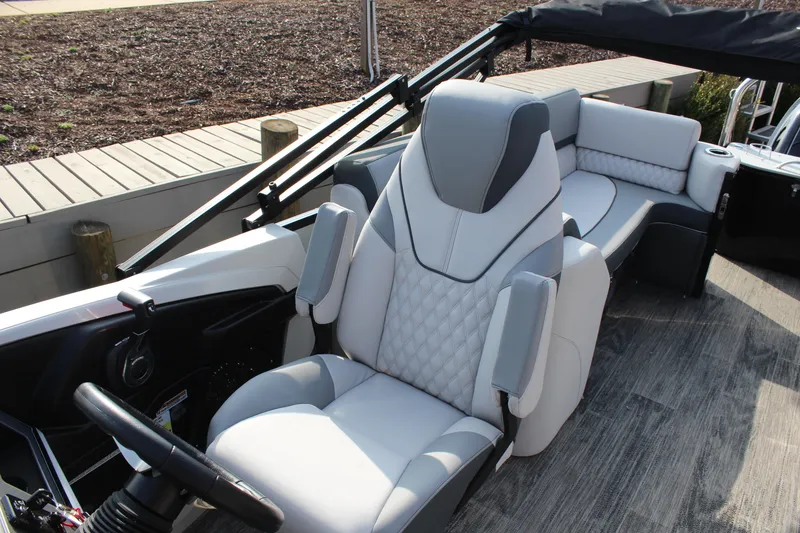Slide: The Image of 2025 Tahoe Pontoon Cascade QLS interior with luxurious seating and modern design. - 8