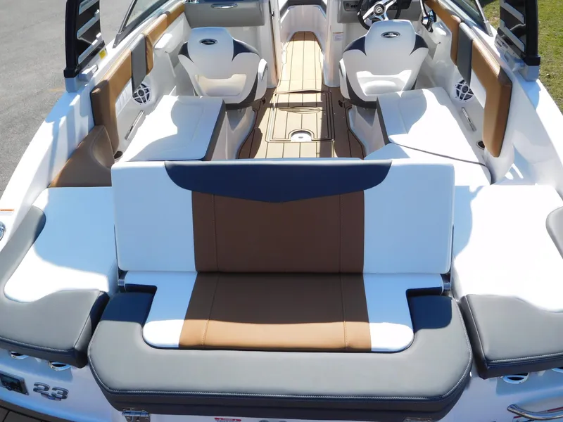 Slide: The Image of 2025 Chaparral 23 SSi boat interior with stylish seating and modern design. - 10
