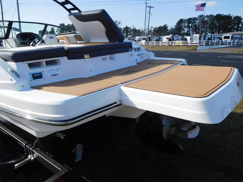 Slide: The Image of 2025 Chaparral 23 SSi boat with spacious swim platform and sleek design. - 14