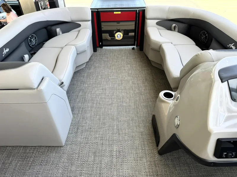 Slide: The Image of 2025 Barletta ARIA 22UC pontoon boat interior with plush seating and modern design. - 27