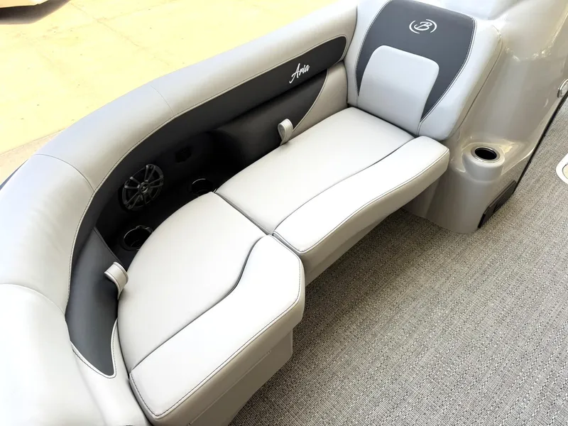 Slide: The Image of 2025 Barletta ARIA 22UC boat interior with gray seating and cup holders. - 32