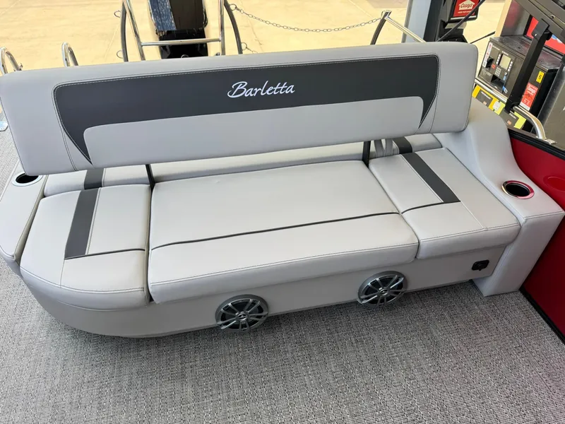 Slide: The Image of 2025 Barletta ARIA 22UC boat seat with gray upholstery and integrated speakers. - 36