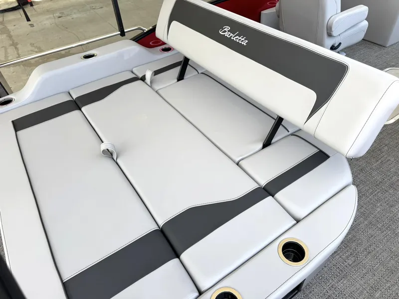 Slide: The Image of 2025 Barletta ARIA 22UC boat seating with cup holders, featuring sleek white and gray upholstery. - 41
