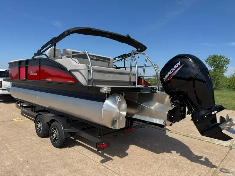 Slide: The Image of 2025 Barletta ARIA 22UC pontoon boat on trailer with Mercury outboard motor. - 8