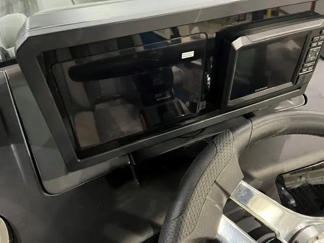 Slide: The Image of Dashboard of 2025 Bennington M 26 Swingback with modern navigation system. - 16