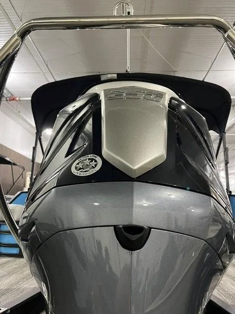 Slide: The Image of 2025 Bennington M 26 Swingback boat, sleek design, showcased indoors. - 4