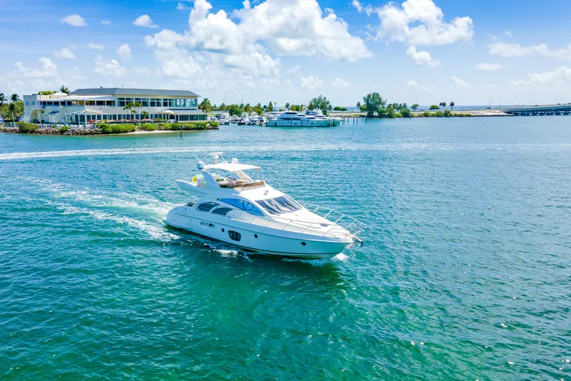 Slide: The Image of Azimut 55E yacht cruising on a sunny day, 2005 model. - 9