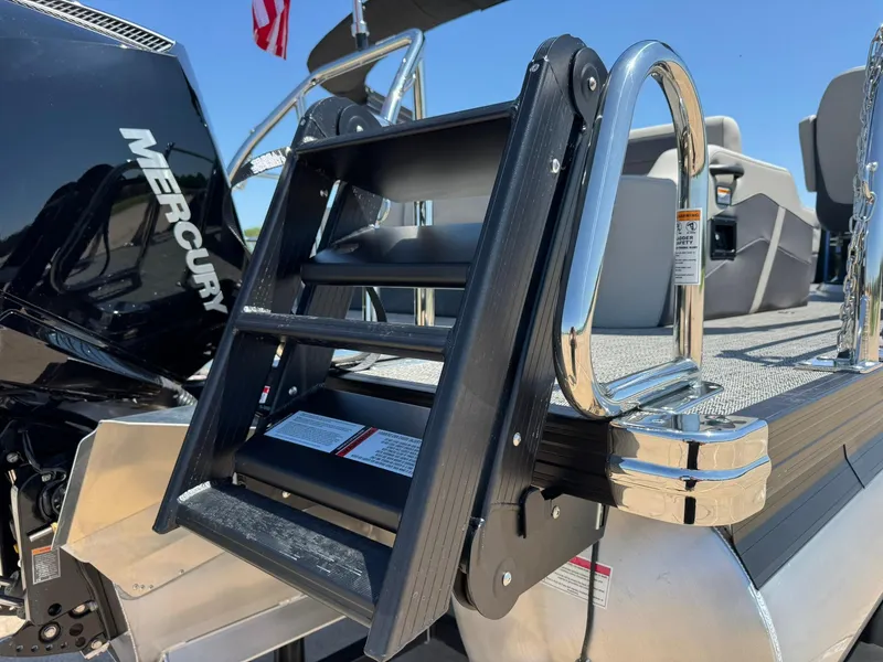 Slide: The Image of Barletta Cabrio 22UC 2025 boat ladder and Mercury engine, showcasing sleek design and functionality. - 16