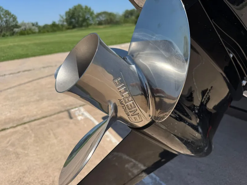 Slide: The Image of Close-up of Mercury Enertia propeller on 2025 Barletta Cabrio 22UC boat. - 17