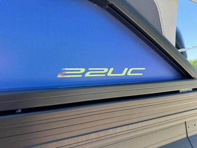 Slide: The Image of 2025 Barletta Cabrio 22UC logo on blue background, close-up view. - 18