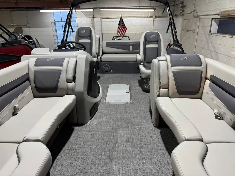 Slide: The Image of 2025 Barletta Cabrio 22UC pontoon boat interior with plush seating and modern design. - 21