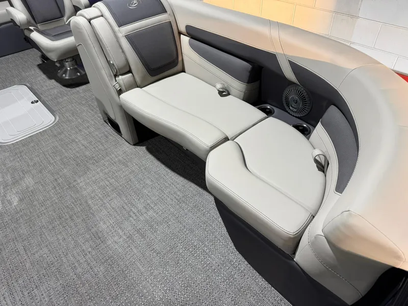 Slide: The Image of 2025 Barletta Cabrio 22UC boat interior with plush seating and modern design. - 22
