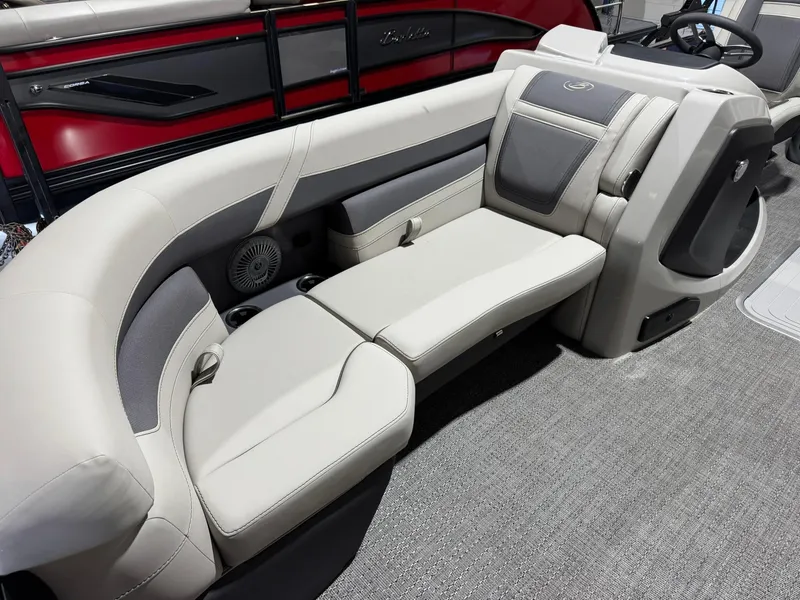 Slide: The Image of 2025 Barletta Cabrio 22UC boat interior with plush seating and modern design. - 23