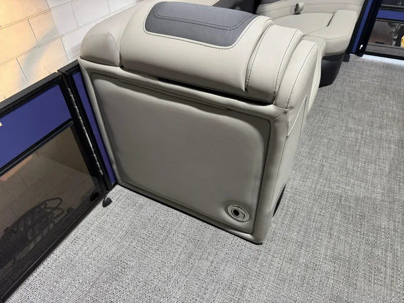 Slide: The Image of 2025 Barletta Cabrio 22UC boat interior with plush seating and modern design. - 40