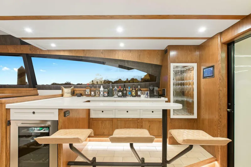 Slide: The Image of Luxurious interior of 2021 Valder Yachts Powercat with modern bar and seating area. - 14