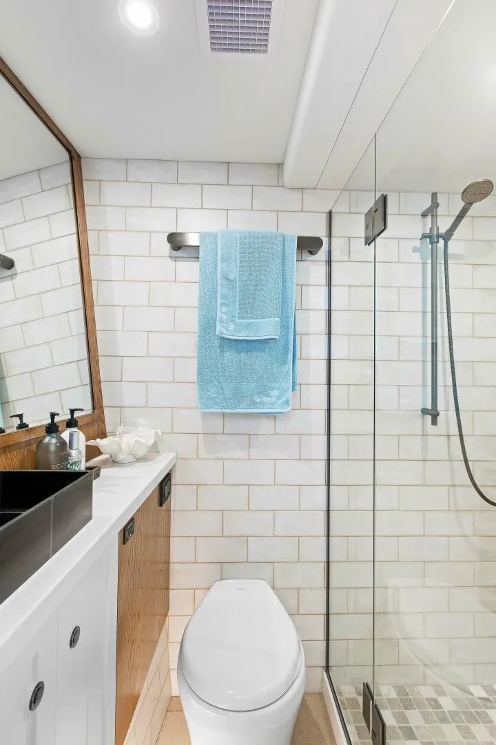 Slide: The Image of Modern bathroom in 2021 Valder Yachts Powercat with glass shower and sleek fixtures. - 19