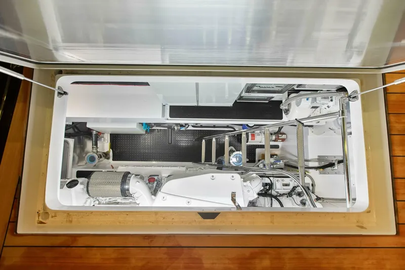 Slide: The Image of Engine compartment of 2021 Custom Valder Yachts Powercat, showcasing mechanical components and equipment. - 22