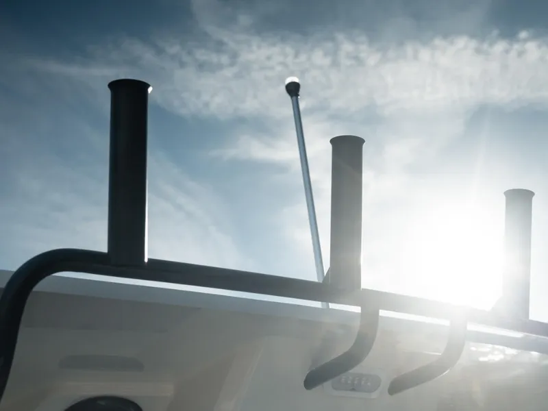 Slide: The Image of Bayliner Trophy T25PH 2024 boat silhouette against a bright sky. - 12