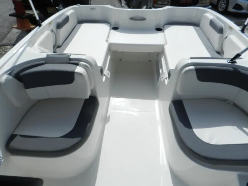 Slide: The Image of 2025 Bayliner E18 boat interior with spacious seating and modern design. - 10