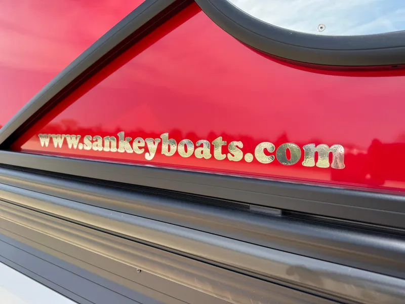 Slide: The Image of Barletta Lusso 23UC 2025 boat with red exterior and website URL displayed. - 15