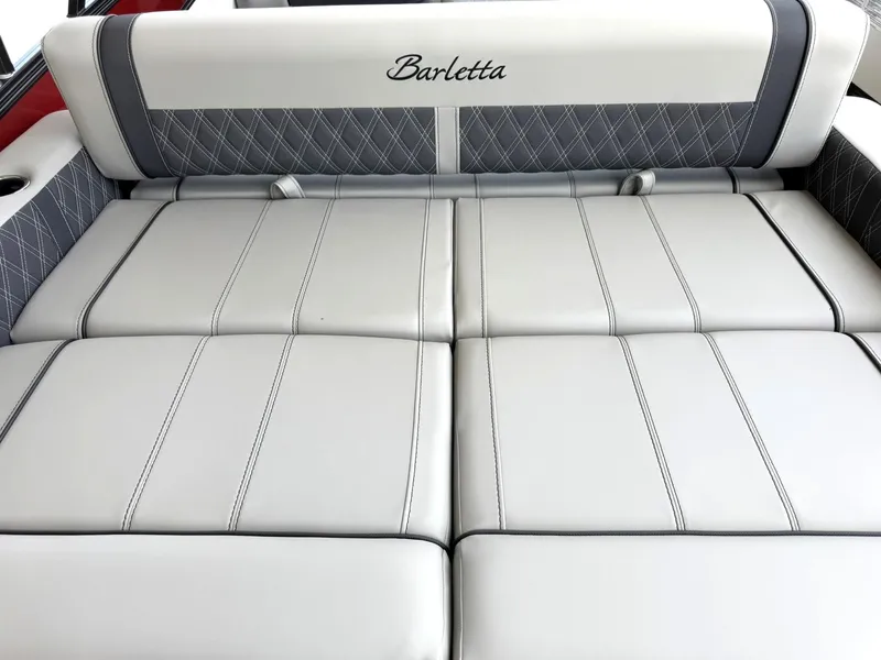 Slide: The Image of 2025 Barletta Lusso 23UC boat seating with elegant gray upholstery and diamond stitching. - 19