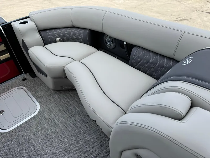 Slide: The Image of Luxurious seating in the 2025 Barletta Lusso 23UC pontoon boat, featuring elegant gray upholstery. - 25