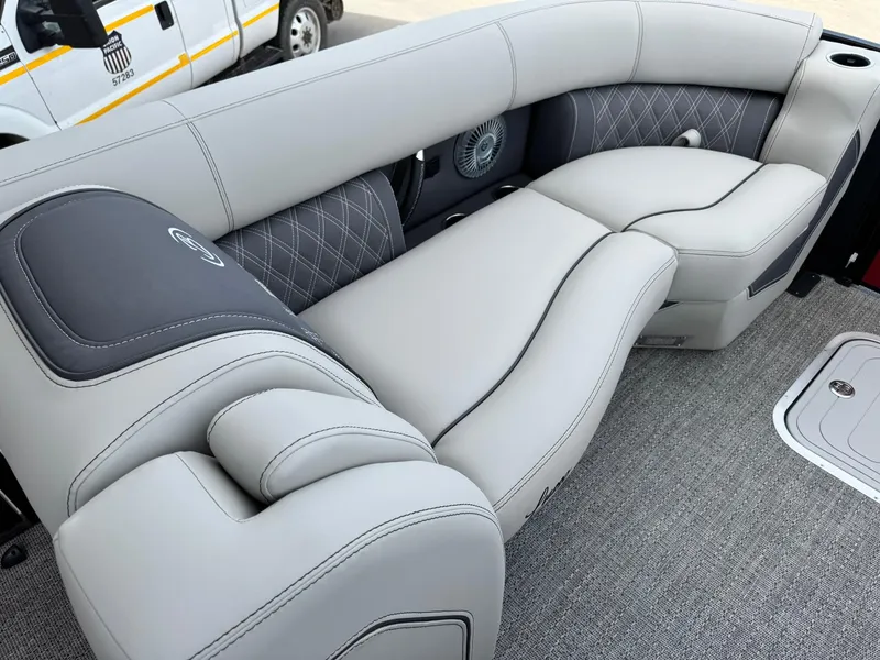 Slide: The Image of Luxurious seating on 2025 Barletta Lusso 23UC pontoon boat, featuring elegant gray upholstery. - 26