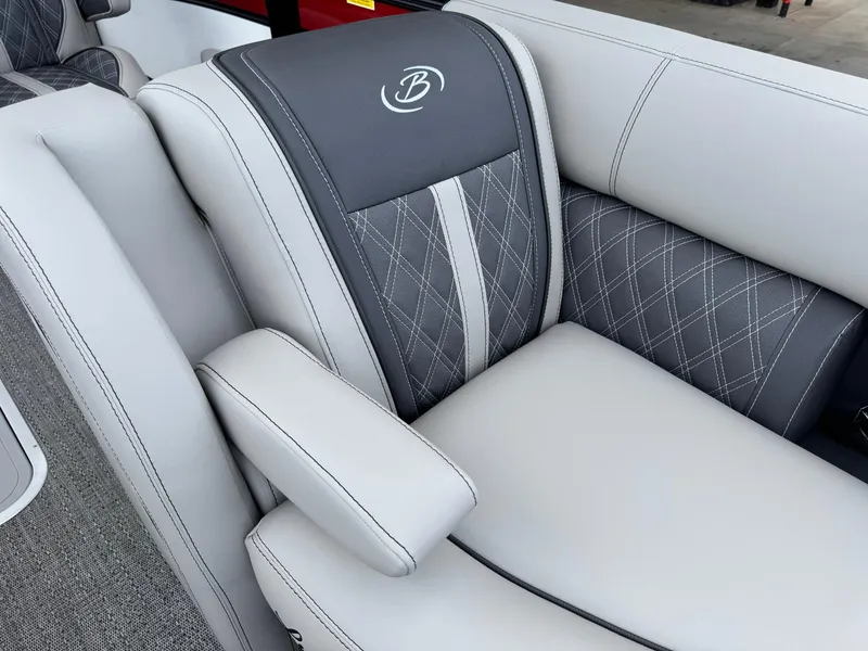 Slide: The Image of 2025 Barletta Lusso 23UC boat seat with elegant gray upholstery and diamond stitching. - 29