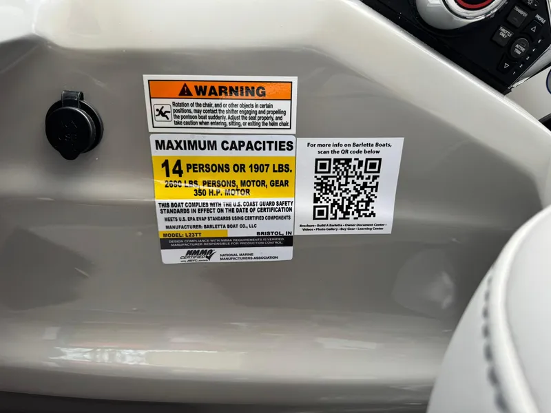 Slide: The Image of 2025 Barletta Lusso 23UC capacity label: 14 persons or 1907 lbs, includes QR code. - 32