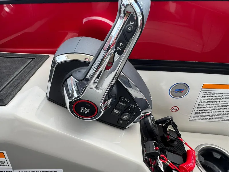 Slide: The Image of Throttle control of 2025 Barletta Lusso 23UC boat with start/stop button. - 33