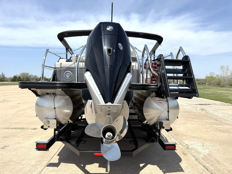 Slide: The Image of 2025 Barletta Lusso 23UC pontoon boat, rear view with motor and ladder. - 8