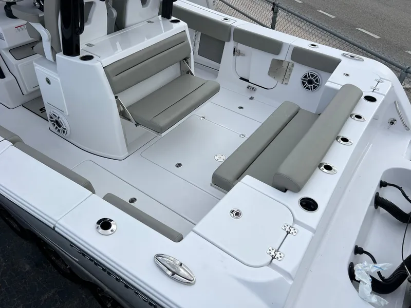 Slide: The Image of 2025 Sportsman Open 322 Center Console boat interior with seating and storage compartments. - 12