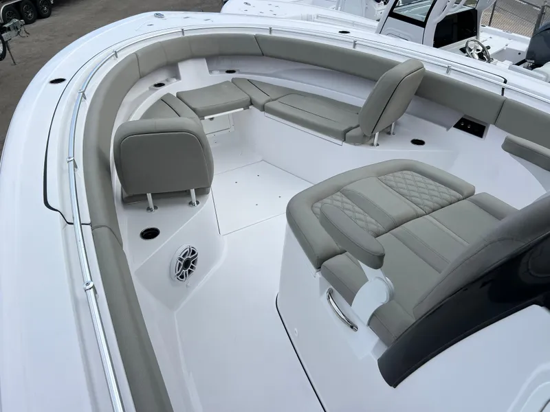 Slide: The Image of 2025 Sportsman Open 322 Center Console boat with spacious seating and modern design. - 19
