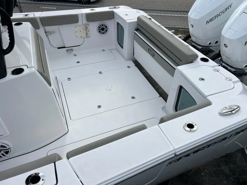 Slide: The Image of 2025 Sportsman Open 322 Center Console boat interior with spacious deck and seating. - 24