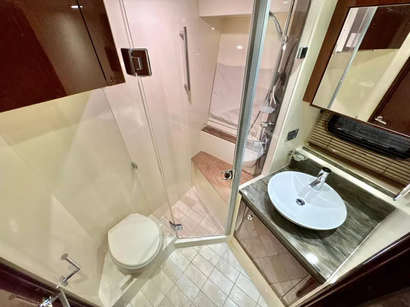 Slide: The Image of Luxurious bathroom in 2014 Sea Ray 510 Sundancer yacht with modern fixtures and elegant design. - 52