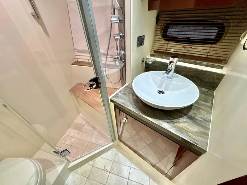 Slide: The Image of Luxurious bathroom in 2014 Sea Ray 510 Sundancer yacht with modern fixtures and shower. - 54