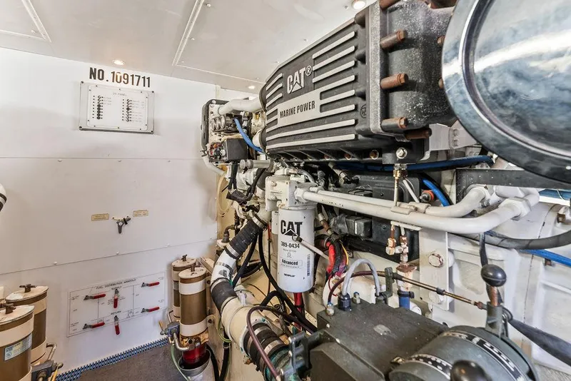 Slide: The Image of Engine room of 2000 West Bay 58 Sonship yacht with CAT marine power engine. - 38