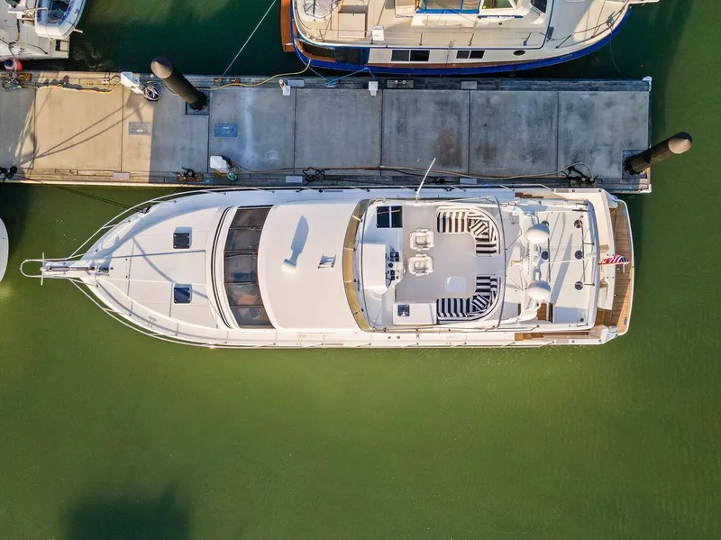 Slide: The Image of Aerial view of 2000 West Bay 58 Sonship yacht docked at marina. - 4