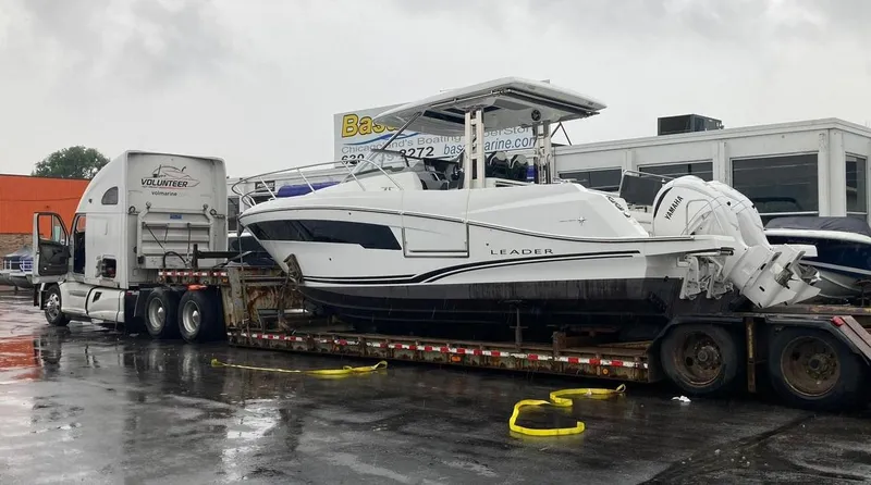Slide: The Image of 2022 Jeanneau Leader 10.5 WA S2 boat on trailer, ready for transport. - 3